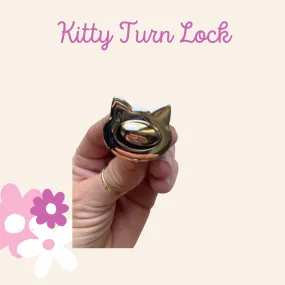 Kitty Turn Lock twist lock gold