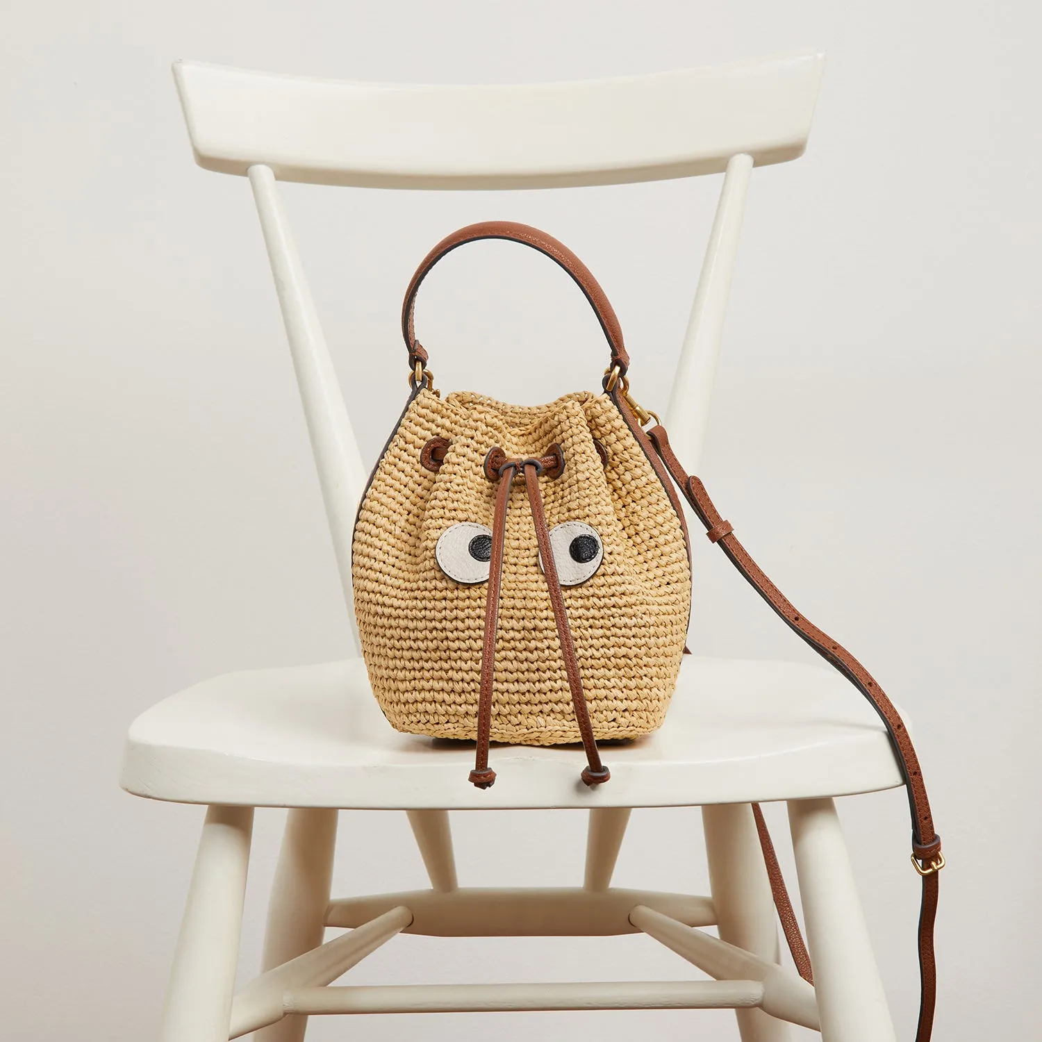 Raffia Eyes Drawstring Cross-body